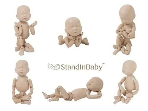 StandInBaby - это тренировочный манекен для детской фотографии. Нет, серьёзно