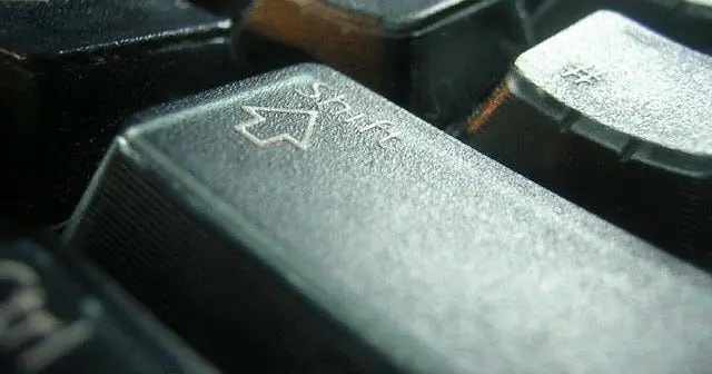 клавиша переключения