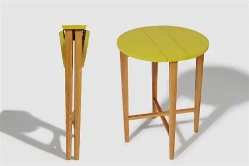 Этот приставной столик складывается в стопку толщиной 4,7 дюйма для удобного хранения