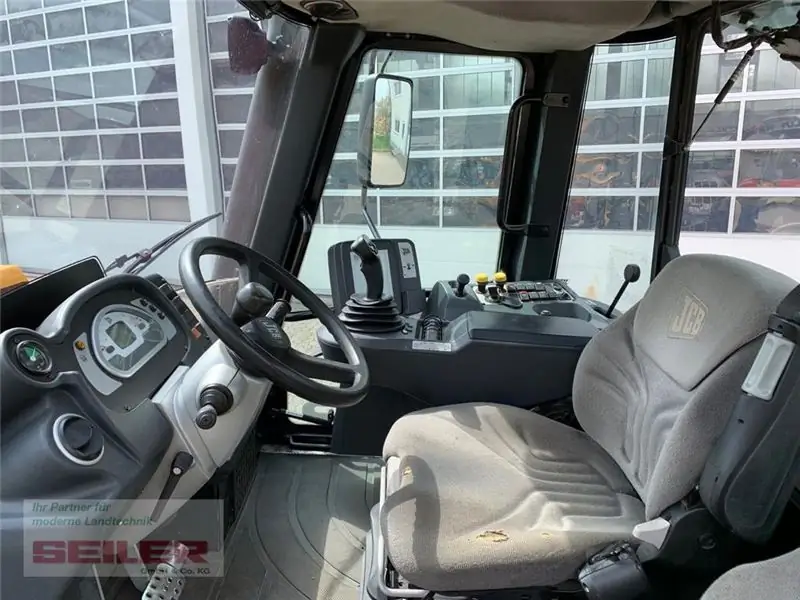 Трактор JCB Fastrac 3230-65 Xtra фото 10