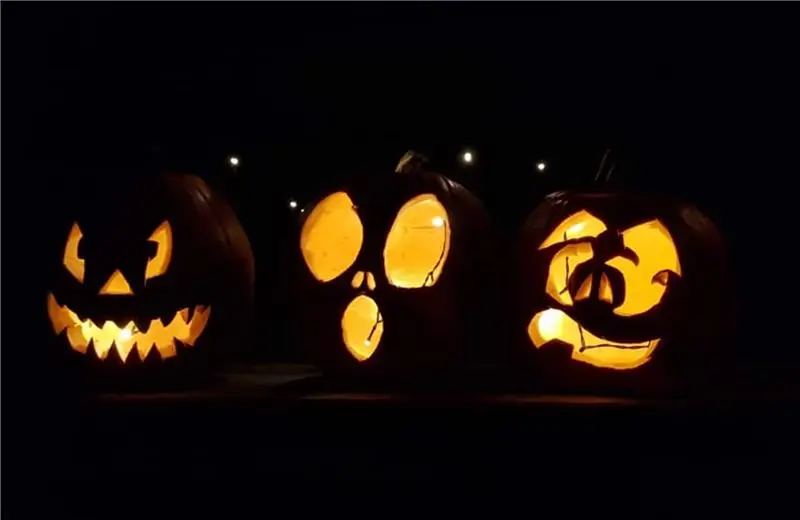 Три резных лица тыквы на Хэллоуин