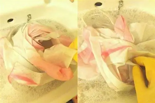 Человек надевает белую рубашку, испачканную отбеливателем в воде.