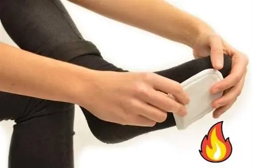 грелка для ног, используемая для согревания ног