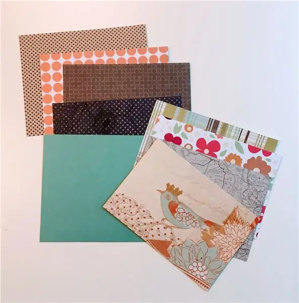 Вырежьте картон и бумагу для вырезок