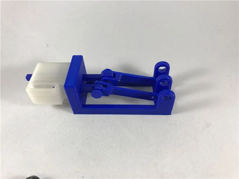 Присоедините рычаг клапана к клапану