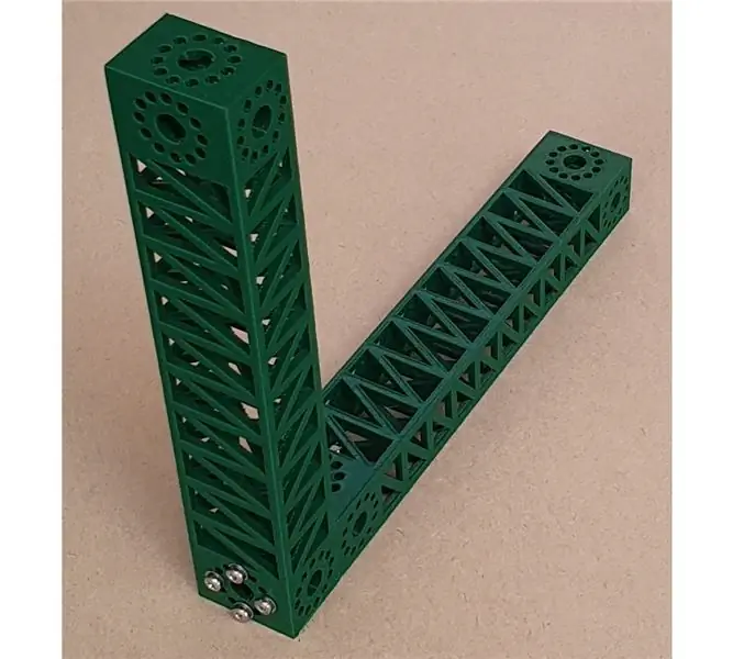 Две балки из PLA, напечатанные на 3D-принтере, скреплены вместе.